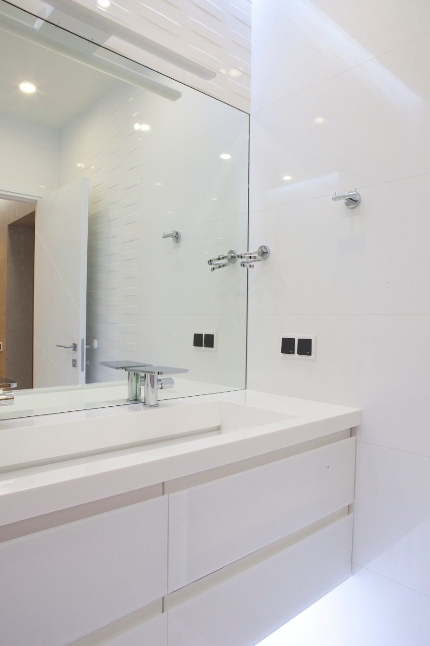 Modern bathroom remodel by AJ Concrete Homes